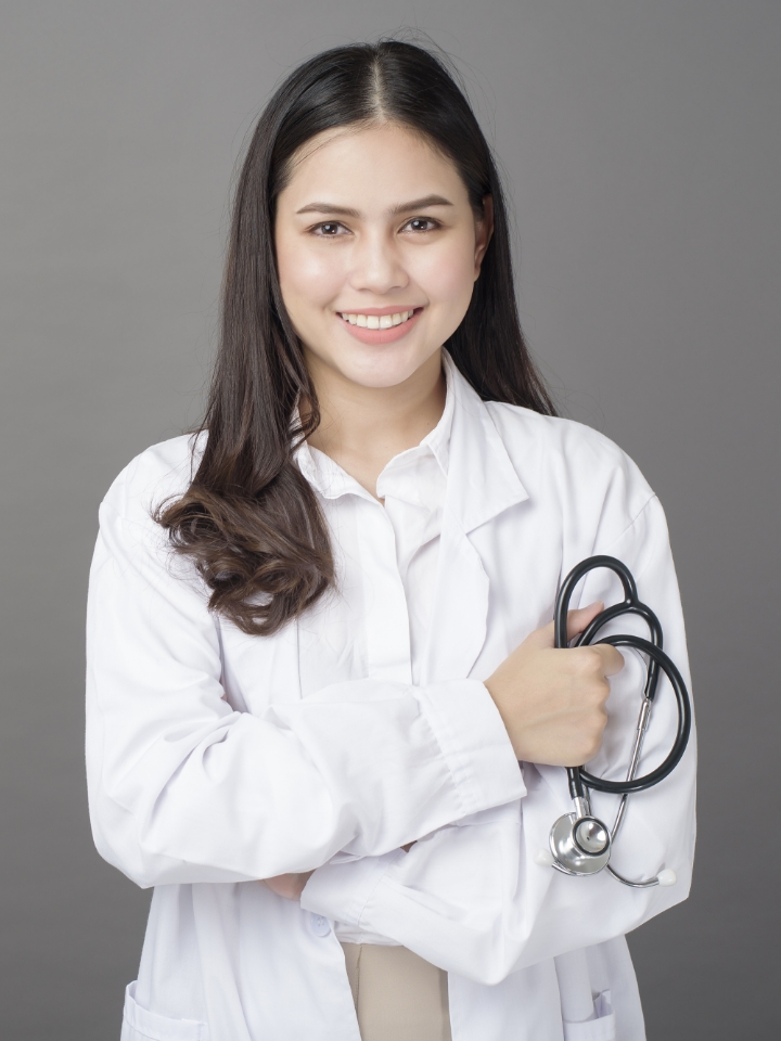 Smiling patient at dental clinic, appointment form background